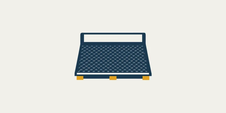 Durable industrial floor scale with an attached ramp for easy loading.