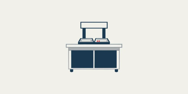 A professional NTEP-certified digital commercial scale on a stainless steel counter in a deli or grocery store setting